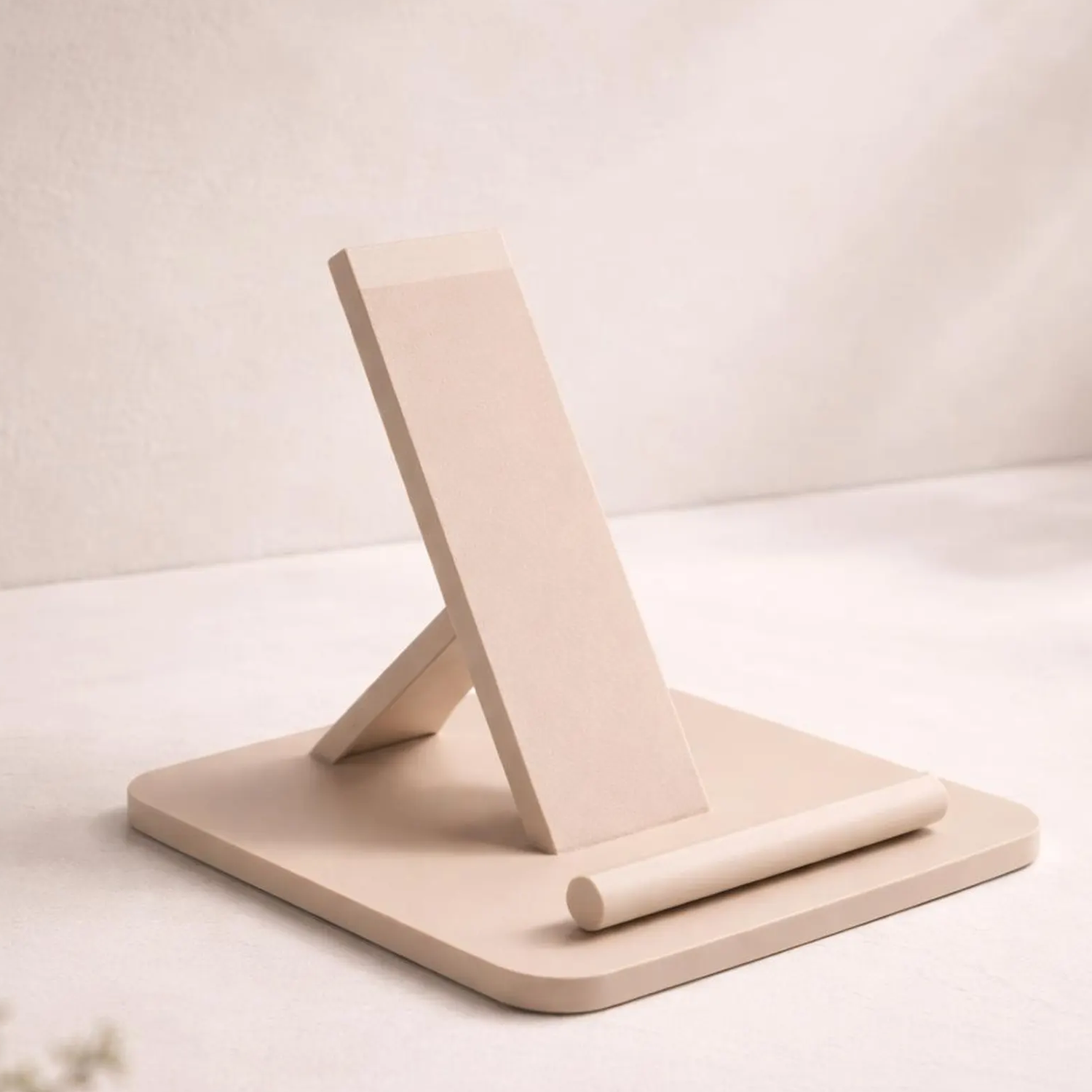 Sleek Geometric Smartphone Support Dock, Neutral Tone Device Holder For Bedside Surfaces And Work Desktops